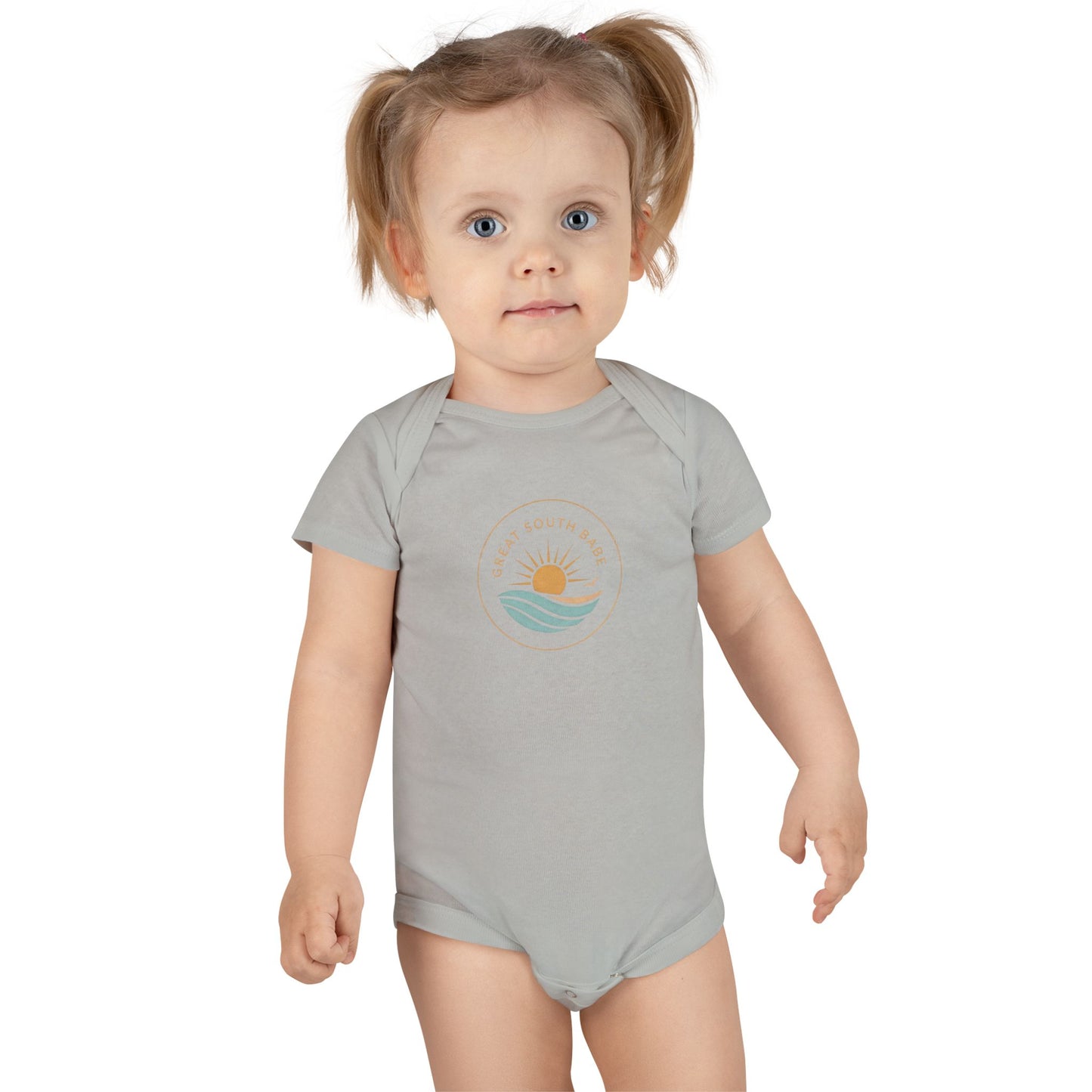 Toddler girl wearing sport grey Great South Babe onesie with sun and waves logo