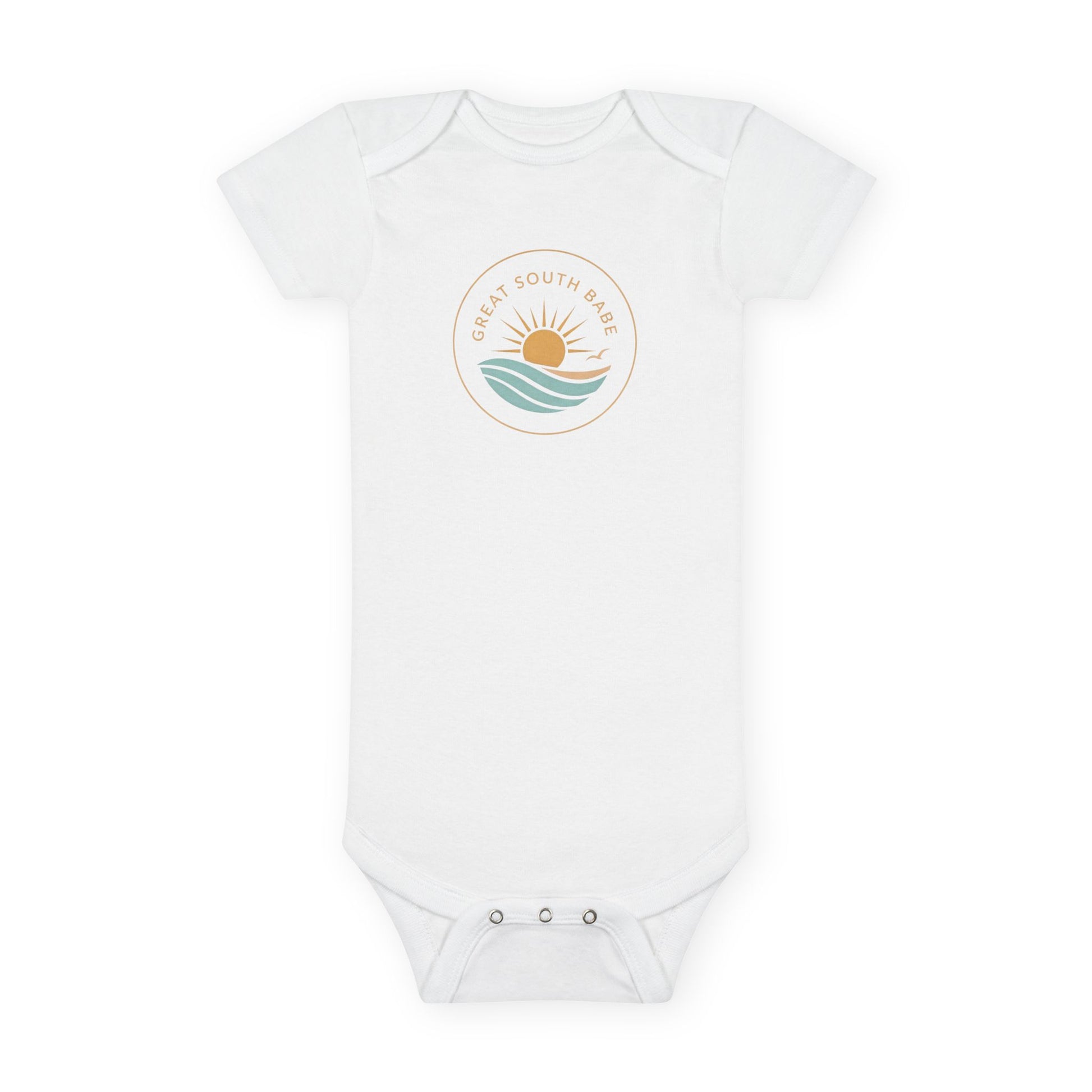 Great South Babe onesie in white with sun and waves logo, flat lay