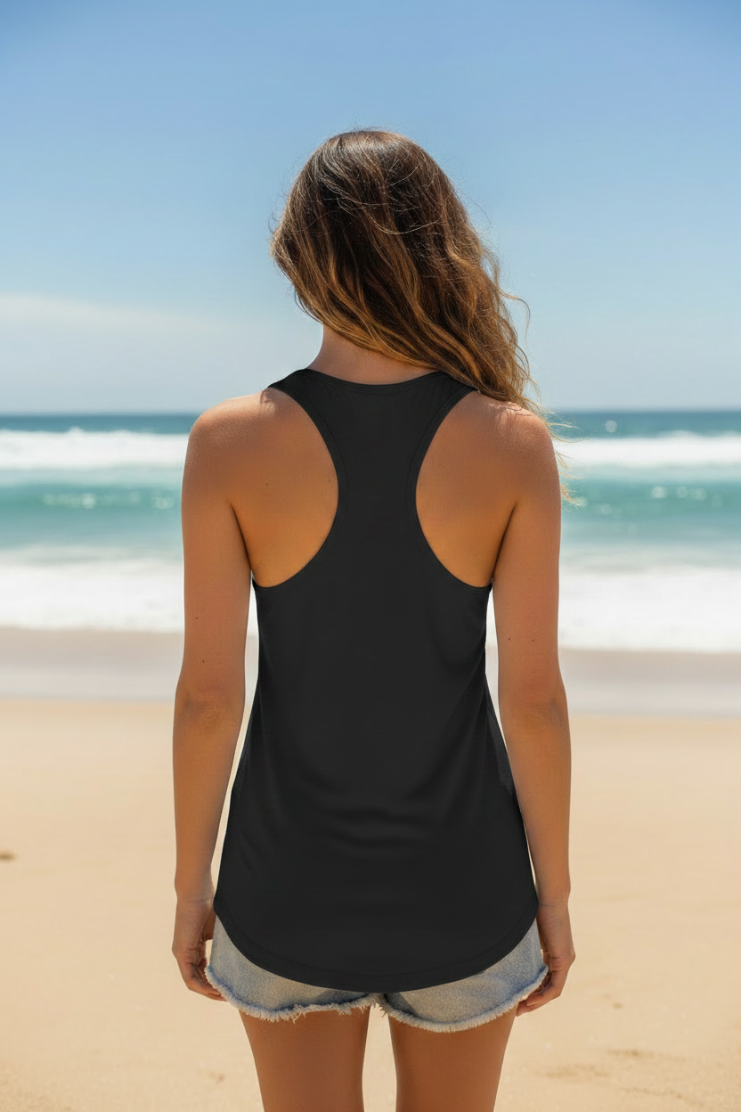 Woman wearing black Great South Babe tank top, back view on the beach
